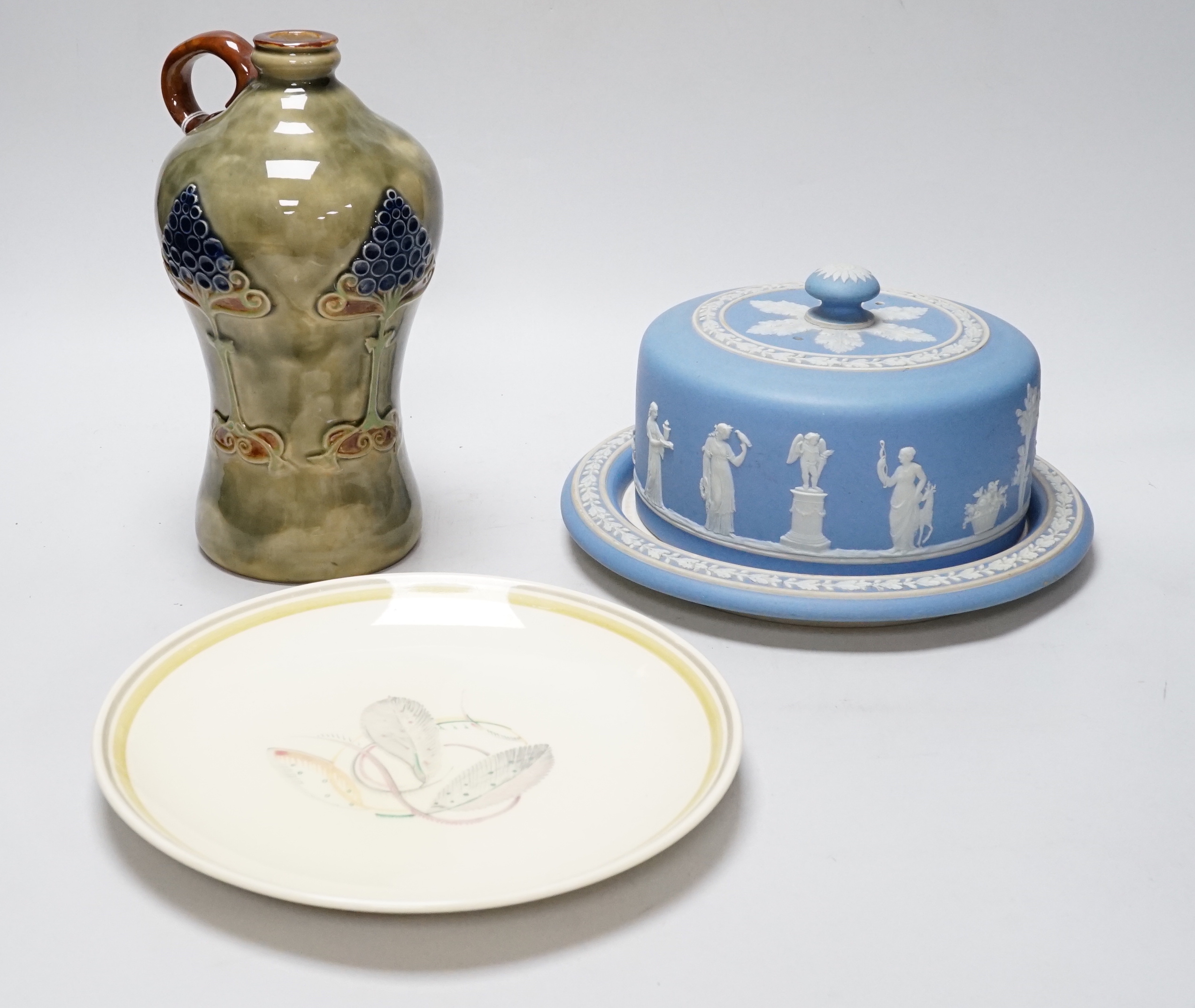 A Wedgwood blue jasper stilton dish and cover, a Royal Doulton Art Nouveau flagon and a Susie Cooper 'Grey Leaf' plate, tallest 22cm